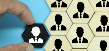 hexagon with an old employee icon and a new employee. the concept of workers or HR