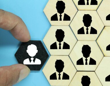 hexagon with an old employee icon and a new employee. the concept of workers or HR